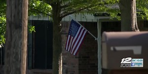 Old flags find a new home in collection box set up by local life scout