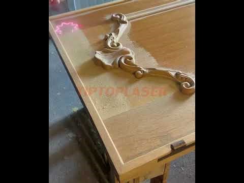 Pulsed laser cleaning machine for cleaning wood.