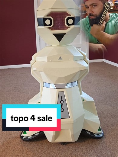 My sister has a topo robot with an old apple computer and software. hollar if u rich #robot #robots #80s #topochico