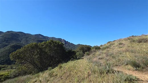 Views from the endpoint of the Hidden Valley Overlook Trail, which is accessible from Rancho Sierra Vista/Satwiwa. There are multiple ways to get there. One way from the Satwiwa Native American Culture Center, take the paved Sycamore Canyon Road south. Turn east (left) on the Old Cabin Trail to the bench at the Sycamore Canyon Overlook. Continue up the rocky trail and you'll reach a fork - take the left fork, which is the HV Overlook Trail. Roughly 4 to 5 miles round trip, but some steep and roc
