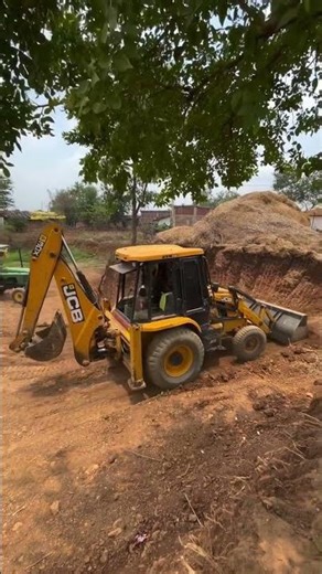 JBC Excavator Working on Construction Site