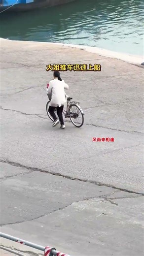 The eldest sister pushed her bicycle onto the boat to cross the river. Safety is the first prior