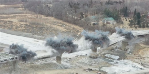 Crews use explosives to bring down damaged bridge