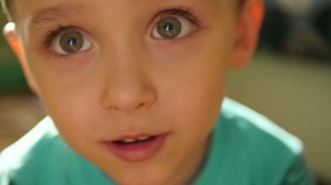 clip-1012802168-close-up-eyes-nose-child-slowed-pace-boy
