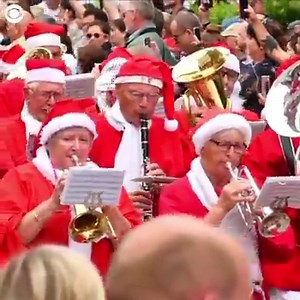 32K views | CHRISTMAS IN JULY: 150 Santas from around the world hopped in their sleighs and met at the 62nd World Santa Claus Congress in Denmark on Monday. The Santas will take part in a number of Christmas-related activities during the four-day celebration - like parades and a Santa obstacle course run. | CBS Newspath | Facebook