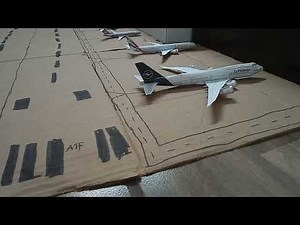 como hacer un aeropuerto de cartón con aviones de papercraft.parte 1