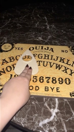 playing with a ouija board (it got scary)