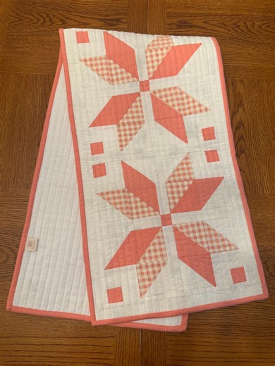 Nordic Star handmade quilted table runner. 100% cotton, in coral and cream 14x52.5”