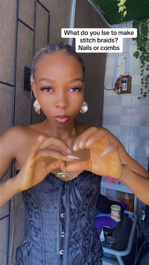 What do you use to make stitch braids¿ nails or comb¿