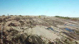 Arabia Mountain abandoned quarry outside of Atlanta, Georgia with old buildings, lake, and mining artifacts