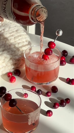 SYNERGY Kombucha on Instagram: "SUGAR DUSTED CRANBERRY TONIC ❤️✨ a sparkling, sugar-rimmed moment made for cozy nights and festive pours. INGREDIENTS: 🧊 ice ❤️ 1 bottle COSMIC CRANBERRY SYNERGY 🥂 tonic water 🍯 agave ✨ sugar 🍒 fresh cranberries INSTRUCTIONS: 1. rim your glass with agave, dip into sugar until perfectly frosted. 2. fill halfway with chilled tonic water over ice. 3. top with COSMIC CRANBERRY SYNERGY. 4. garnish with skewered fresh cranberries. ✨ crisp, tart, and a little magical