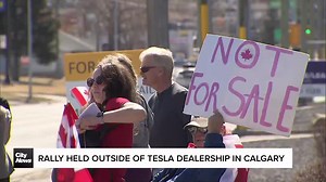Rally held outside Tesla dealership in Calgary