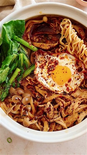 This Spicy Chicken Noodle soup is the perfect dish to use up leftover cooked chicken or turkey! https://iheartumami.com/spicy-chicken-noodle-soup/ The broth is infused with fried ginger, scallions, and a touch of chili flakes for a spicy kick. It’s all made in one pot, with protein, veggies, and a fried egg on top. So easy and so delicious. Don’t miss it! | I Heart Umami