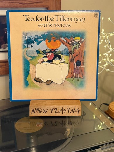 Tea for the Tillerman is the fourth studio album by singer-songwriter Cat Stevens, released in November 1970. Tea for the Tillerman includes many of Stevens's best-known songs such as "Where Do the Children Play?", "Hard Headed Woman", "Wild World", "Sad Lisa", "Into White", and "Father and Son". Stevens, a former art student, created the artwork featured on the record's cover. | My Humble Vinyl Records