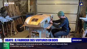 Ubaye: un sculpteur fabrique des maquettes de voitures en bois