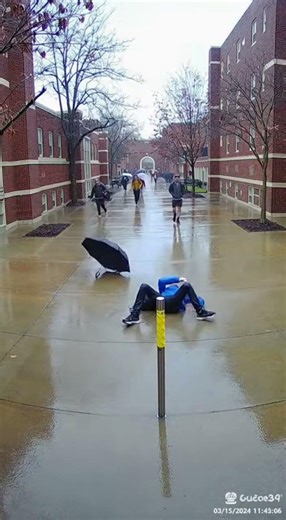 Campus Pole Fail: Engineering Student's Worst Day | Security Cam