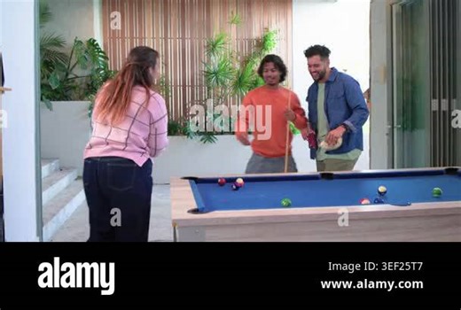 Diverse friends cheering, guiding woman arriving at patio pool table, bracing cue, breaking rack. Recreation, socializing, leisure, modern, vibrant, teamwork, outdoor Stock Video Footage - Alamy