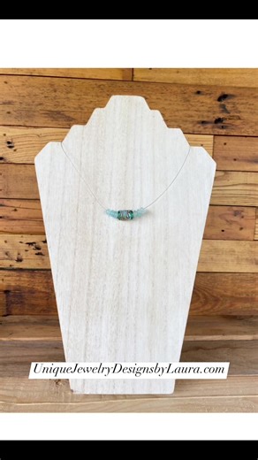 Aqua and Light Blue Floating Necklace - TODAY ONLY - 25% OFF!!! This necklace features a cylinder glass bead that is aqua and light blue and is sandwiched between a set of three light blue glass beads on both sides. Adjustable in length, the wire necklace makes the beads look like they are floating around your neck. https://www.uniquejewelrydesignsbylaura.com/product-page/aqua-and-light-blue-floating-necklace #blue #floating #necklace #aqua #sale @everyone @highlight