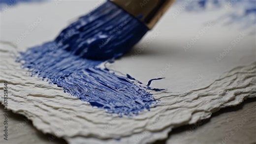 Painting Process - Blue Paint on Textured Paper with Brush.