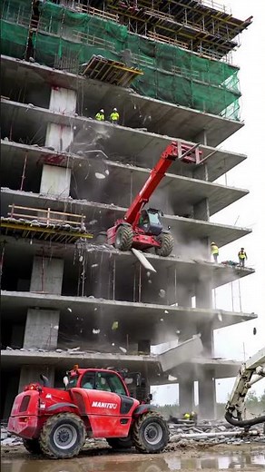 This big red machine really knows how to POUND it from above. #construction