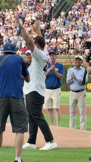 Anthony Rizzo throws the first pitch joined by Eddie Vedder and Bill Murray!