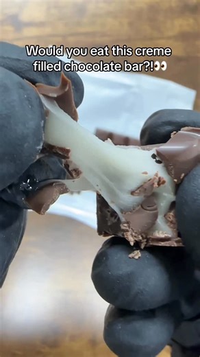 @poppincandyofficial on Instagram: "Would you eat this CREAMY CHOCOLATE BAR?! #instagood #viral #satisfying #asmr #explorepage #candies #funny #tastetest"