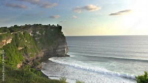 Pura Luhur Uluwatu. Bali Indonesia, the Panoramic view in time sunset
