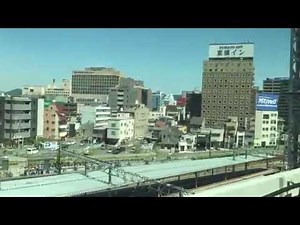 東横イン岡山駅西口右と、岡山気動車区の外観を新幹線車内から