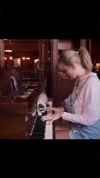Taylor Swift playing piano
