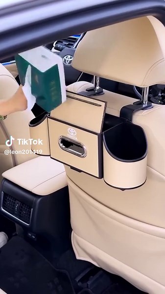 🚗 This car storage box is favored by experienced drivers and wealthy bosses. 📦 Its extra-large capacity makes it easy to keep your car tidy. 🧲 It features a secure installation to ensure it won't slip or slide during drives. 🌿 Made from high-quality materials: it's wear-resistant, stain-proof, durable, fits various models, and keeps your car's interior looking brand new.