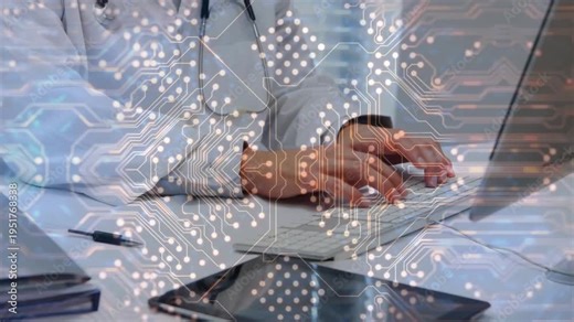 Male doctor placing hands on keyboard, typing, updating records, circuitry overlaying workspace