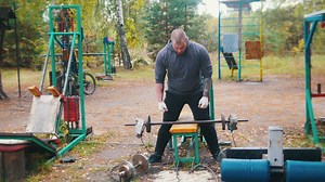 Man exercising in a gym, outdoors - Free Stock Video
