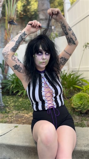 Mandy Seal on Instagram: "💜 It’s Showtime! halter top💚 Only about 24 hours left to use code SUPERSTAR for 20% off your order at Mandyseal.com 💋 #beetlejuice #stripes #fashion #alternative #cute"