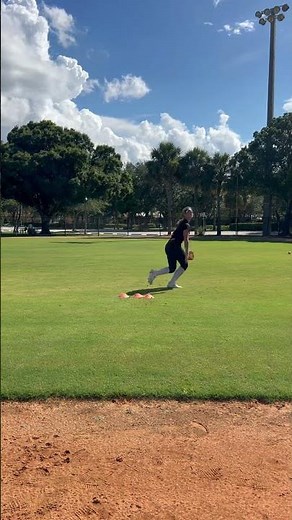 Outfield drop step drill. See description on why I hop over cones.