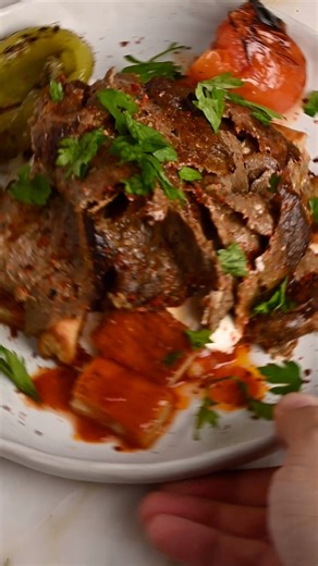 The viral doner kebab recipe hack you need to try!🔥 Tastes just like the real thing.Grill it over high heat using my @gozney arc oven and enjoy Ingredients:750 grams beef mince (80:20 meat to fat ratio)1 medium onion 1 tablespoon garlic paste 1 teaspoon salt 1 teaspoon paprika 1 teaspoon Pul Biber - Turkish Crushed Red Chilli 1 teaspoon red chilli powder 1 teaspoon garlic powder 2 tablespoons olive oil 2 tablespoons yogurt #donerkebab #donerkebabrecipe #donerrecipe #viraldonerkebab #donerkebaba