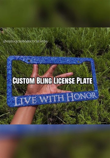 LIVE WITH HONOR 💙✨ Thousands of individually placed glass rhinestones transformed this license plate frame into a statement piece. The best part is always seeing it catch the sunlight. ☀️💎 Custom license plate frames are available and can be personalized with names, schools, teams, businesses, cities, or your favorite quote. ✨ Link in bio #LicensePlateFrame #RhinestoneArtist #CustomBling #HandmadeLuxury #FYP