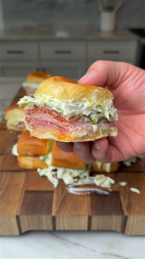 Nick Nesgoda on Instagram: "Hot Italian Grinder Sliders These are super easy and a family favorite! Recipe • Slice @kingshawaiian Rolls in half • layer meat and cheese: pepper jack cheese, salami, ham, pepperoni and provolone cheese • Brush top buns with garlic herb butter: 2 tbsp melted butter, 1 tsp garlic powder, 1 tbsp fresh parsley • Bake at 350F for 20 mins • Assemble lettuce topping with: 1 cup mayo, 2 tbsp red wine vinegar, 1 tbsp olive oil, 1 tbsp Italian seasoning. Mix then add a bag o