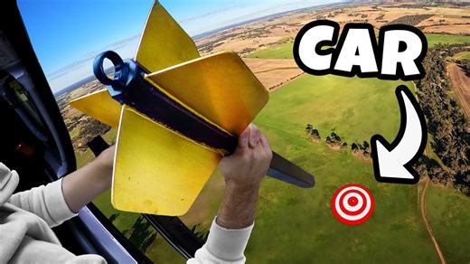 Watch what happens when you drop a giant dart from 1000 ft