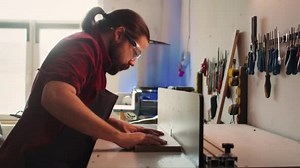 Woodworker Operating Spindle Moulder Create Bespoke Joinery Coworker Background Manufacturer