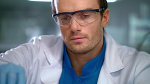 Scientist face. portrait of researcher working in safety glasses Free Stock Video Footage