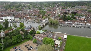 Henley on Thames Oxfordshire UK High Aerial footage town and Henley bridge.