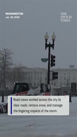National Guard members were seen shoveling free a snowbound bus in Washington as tens of millions of Americans continued digging out in the wake of a massive winter storm. | The Epoch Times