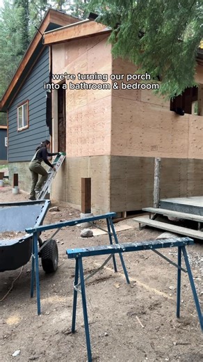 Madison Clysdale on Instagram: "The walls are up!! We framed in our porch because our current 16ft x 16ft cabin we live in full time doesn’t have a bathroom or a bedroom. The new deck framing is next ahhh #cabinbuild #homestead"