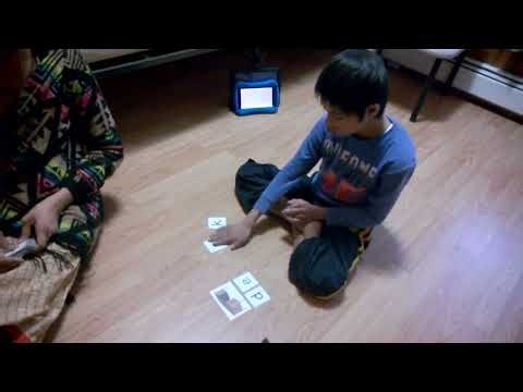 Siddu doing table work matching picture to word, word to picture and word to word!!!!!