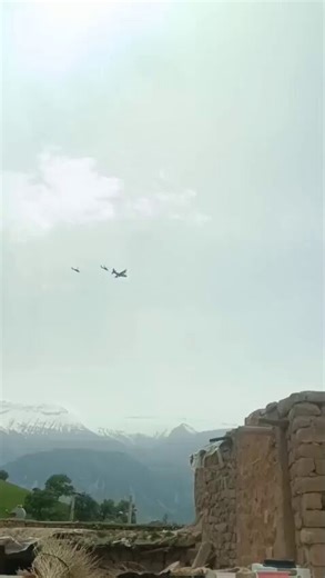 A U.S. MC-130J Special Operations Command aircraft is seen refuelling two UH-60 Black Hawk helicopters as it flies to carry out an imminent special operations mission in central Iran, likely aimed at rescuing any surviving pilots from the earlier F-15E crash.