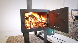 The Guide Gear Outdoor Wood Stove brings added comfort, warmth & a place to cook. Built strong and priced low at $119.99! | Sportsman's Guide