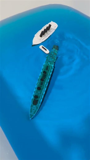 Big, medium, and tiny Lusitania model ships