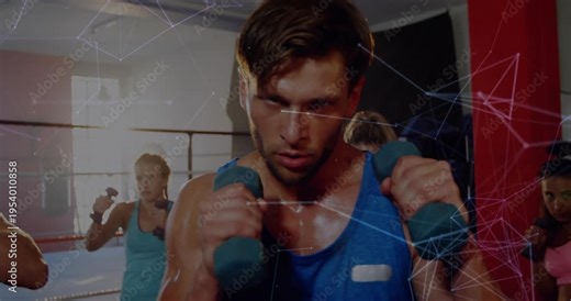 Coach thrusting weights leading class copying boxing jabs, shot widening, network overlay appearing
