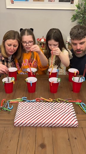 74K views · 520 reactions | Fun candy cane game 拾 The first person to transfer all 5 candy canes is the winner 朗 #holiday #game #family #fun #viral #video | Rob And Elizabeth | Facebook