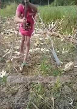 Beautiful polio girl working with useless crippled leg.
